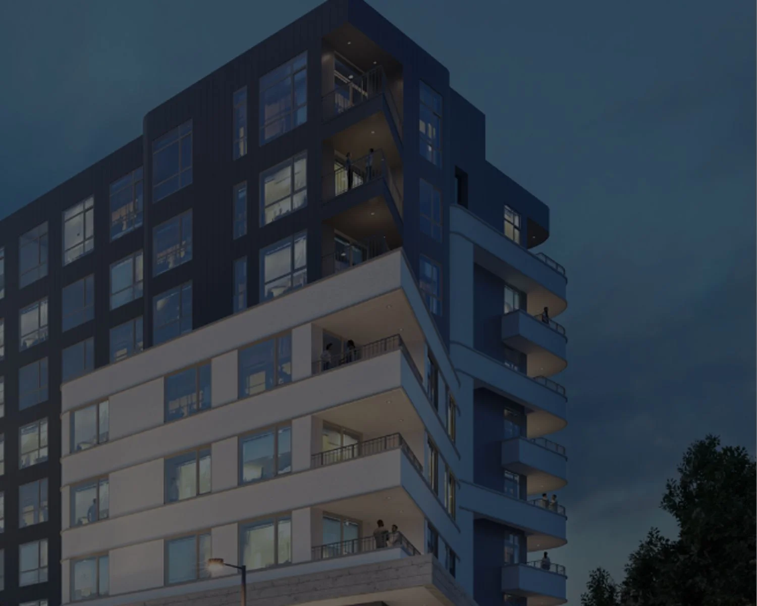 Brown and white multi-family building in Denver, Colorado with blue sky in the background.
